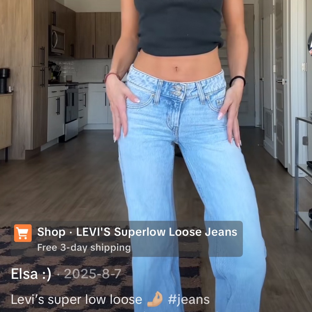 Levi's Black Crop Top and Light Blue Jeans